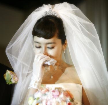 ▲ 지난 2007년 두 살 연하의 재미동포 사업가 김문철 씨와 웨딩마치를 올리던 당시의 이승연.&nbsp; ⓒ 연합뉴스