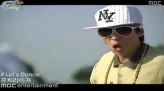 ▲ 유재석과 무한도전 팀이 연출한 '퓨처라이거'의 뮤직비디오 장면.  ⓒ 뉴데일리