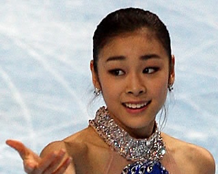 ▲ '피겨퀸' 김연아가 210.03점으로 여자 싱글 역대 최고점을 경신하면서 그랑프리 대회 6회 연속 우승을 했다. 김연아는 18일 새벽(한국시간) 2009-2010 국제빙상경기연맹(ISU) 피겨 시니어 그랑프리 1차 대회가 열린 팔레 옴니스포르 드 파리-베르시 빙상장에서 프리스케이팅 점수 133.95점을 기록해 총점 210.03점으로 1위에 올랐다. ⓒ 연합뉴스