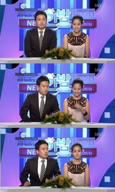 ▲ 지난 12일 방송된 SBS 한밤의 TV연예에서 송지효가 고 앙드레김의 별세소식을 전하다 웃음을 내보이고 있다. ⓒ 방송화면