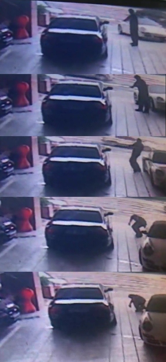 ▲ 뺑소니 혐의자로 몰린 한예슬이 경찰에 제출한 아파트 폐쇄회로 영상. 한예슬이 운전하는 흰색 포르쉐 차량에 도씨가 엉덩이 부분을 부딪히는 장면이 담겨 있다.   ⓒ 뉴데일리