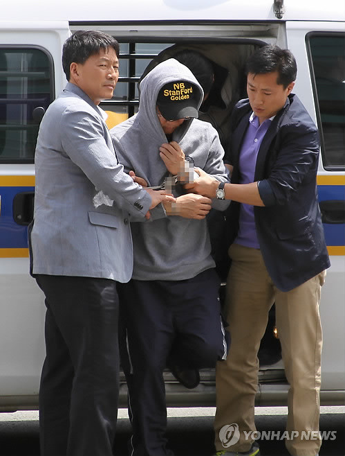 ▲ 재혼 1년만에 이혼소송 중이던 아내를 살해하고 시신을 유기한 혐의를 받고 있는 대학교수 강모씨.ⓒ연합뉴스