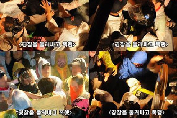 ▲ 2차 희망버스 당시 경찰을 둘러싸고 폭행하는 시위대. 이 일이 일어난 뒤 경찰은 최루액을 발사하기 시작했다. 부산 시민들 또한 2차 시위 이후 반발이 생겼다.