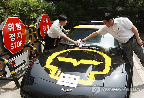 ▲ 6월 20일 경찰에 압수됐을 당시 '노란 콜벳'의 모습.