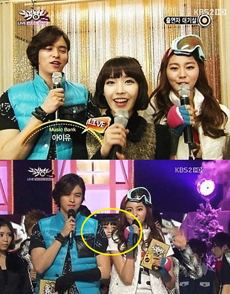 ▲ 가수 아이유가 이장우와 유이 사이에서 키 굴욕을 당했다.ⓒ 뮤직뱅크 방송화면 캡쳐