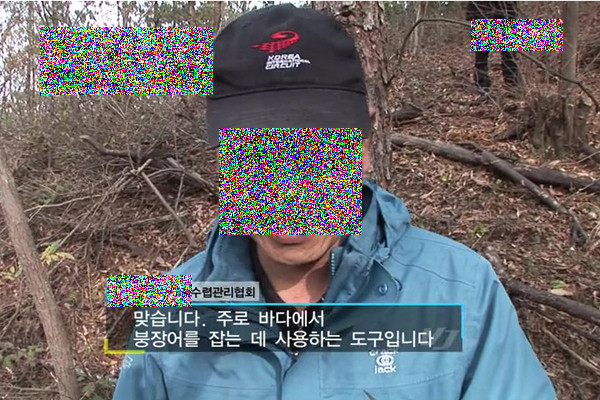 ▲ 공중파 방송에 출연한 문제의 '사냥꾼'. 그는 초등학생들을 대상으로 한 교육프로그램을 실시한 적도 있었다.