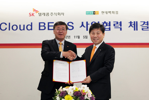 ▲ ⓒ왼쪽부터 SK텔레콤 박인식 기업사업부문장, 현대백화점 하병호 사장.