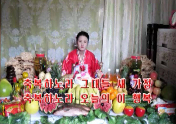 ▲ 북한의 신부 혼자 결혼식. 사진은 여유있는 집 결혼식 선전 화면.