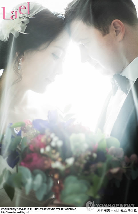 ▲ 가수 제이(J)의 웨딩사진. (본 사진은 기사와 관계 없음). ⓒ연합뉴스