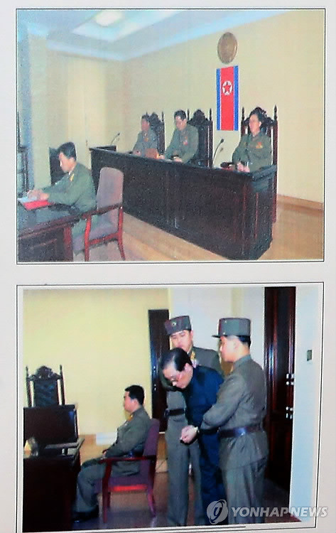 ▲ 서상기 국회 정보위원장이 지난 13일 오전 장성택 북한 국방위 부위원장 처형 관련 브리핑에서 공개한 처형 직전 재판 사진.ⓒ 연합뉴스