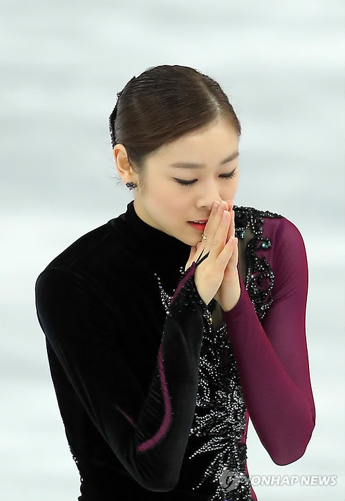 ▲ = 피겨여왕 김연아가 21일 오전 (한국시간) 러시아 소치 아이스버그 스케이팅 팰리스에서 열린 2014 소치 동계올림픽 피겨스케이팅 여자 싱글 프리프로그램에서 무결점 연기를 마친 뒤 감격에 겨워하고 있다. 김연아는 러시아 아델리나 소트니코바에 이어 은메달을 획득했다.ⓒ연합뉴스