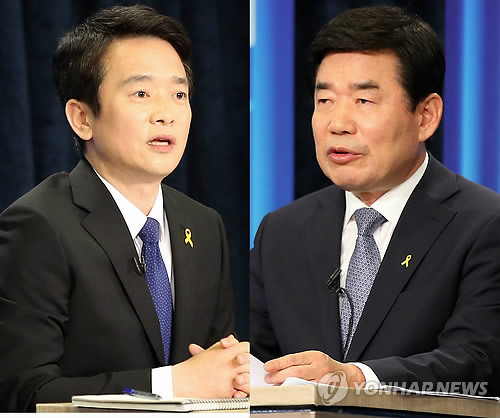 ▲ 한국정당학회 매니페스토 정책평가에서 수도권 후보 중 1위를 차지한 새누리당 남경필 경기도지사 후보와 C+ 평가에 그친 새정치민주연합 김진표 후보. ⓒ연합뉴스