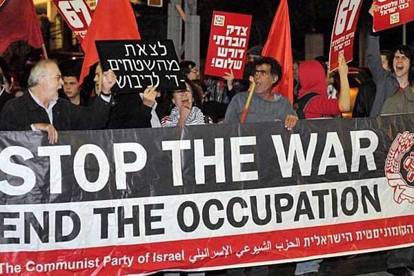 ▲ 이스라엘 정부를 비난하는 시위를 벌이는 이스라엘 공산당(CPI) [이스라엘 언론 보도화면 캡쳐]