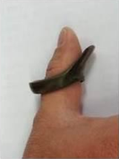 ▲ 엄지손가락에 끼운 활깍지. ⓒ뉴데일리 사진DB