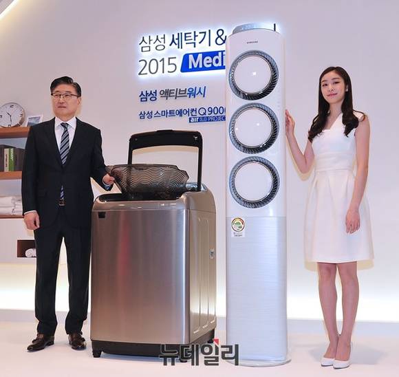 ▲ 윤부근 삼성전자 대표(왼쪽)와 삼성전자 모델 김연아 ⓒ뉴데일리 정재훈 사진 기자