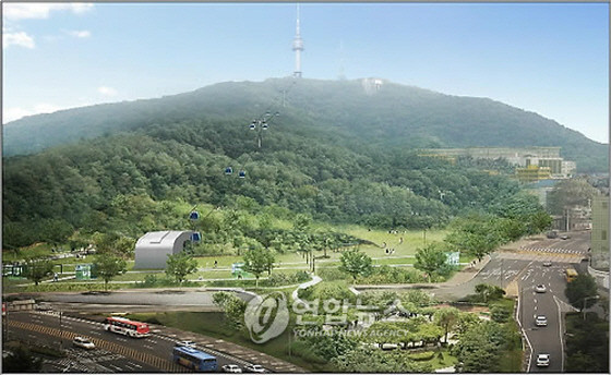 ▲ 남산 곤돌라 승차장이 들어설 예정인 남산 예장자락 방향에서 남산 정상의 N서울타워를 바라본 조감도. 해당 사업은 2011년 오세훈 전 서울시장 재임기에도 검토됐으나, 무산된 바 있다. ⓒ연합뉴스 사진DB