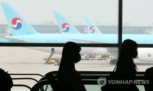 ▲ 마스크 쓴 관광객들.ⓒ연합뉴스