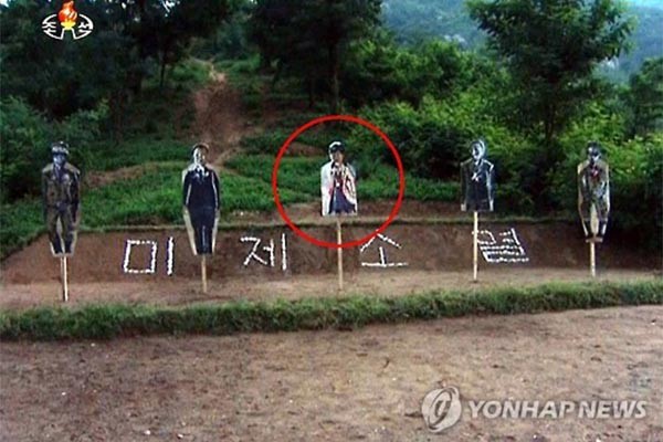 ▲ 北관영선전매체 조선중앙통신이 지난 12일 보도한 방송에는 박근혜 대통령 사진을 실탄 사격 표적지로 삼은 모습이 나온다. ⓒ연합뉴스. 무단전재 및 재배포 금지.