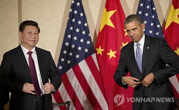 ▲ 2014년 3월 네델란드 헤이그에서 열린 핵안보정상회의 당시 시진핑 中공산당 총서기와 버락 오바마 美대통령. ⓒ연합뉴스. 무단전재 및 재배포 금지.