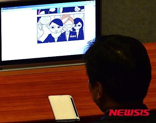 ▲ 더불어민주당 홍종학 의원은 박근혜 대통령 연설 도중 웹툰을 보고도 "당무중이었다"고 답했다. 그는 자신이 디지털소통본부장임을 내세워 당 내 카페에 올라온 콘텐츠를 검토한 것이라고 항변했다. ⓒ뉴시스 DB