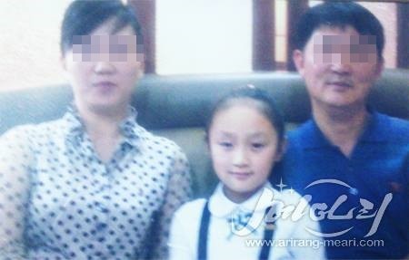▲ 리진미 가족 사진.ⓒ북한의 대외용 매체 '메아리'