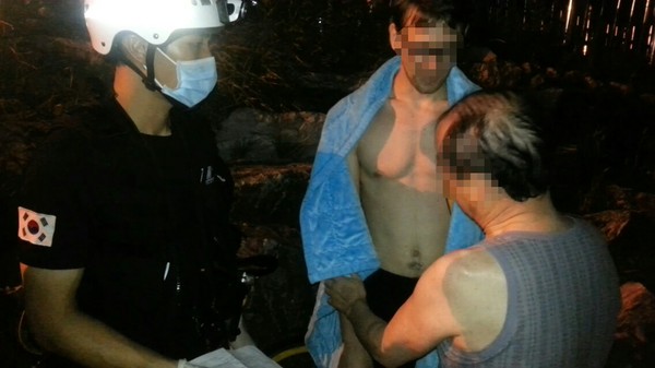 ▲ 지나가던 미국인 20대 청년이 수영강에 투신한 50대 남성을 무사히 구조했다.ⓒ부산 해운대경찰서 제공