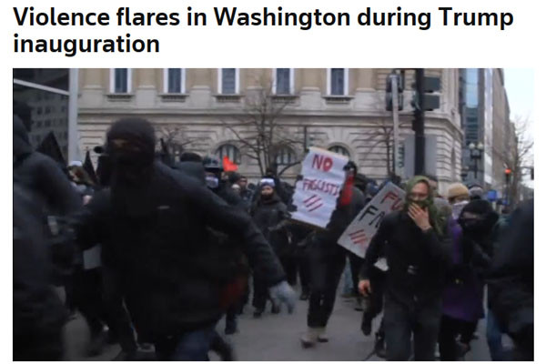 ▲ 도널드 트럼프의 대통령 취임식이 열리던 시간, 워싱턴 한 쪽에서는 이 같은 모습을 한 복면시위대가 폭력시위를 벌였다. ⓒ英로이터 통신 관련보도 화면캡쳐