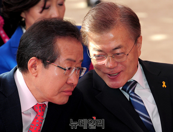 ▲ 문재인 대통령과 자유한국당 홍준표 대표. 자료사진은 지난 5월 대선선거운동 기간 중 대선후보로서의 모습이다. ⓒ뉴데일리 공준표 기자