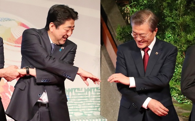▲ 문재인 대통령(오른쪽)과 아베 신조 일본 총리. ⓒ뉴시스