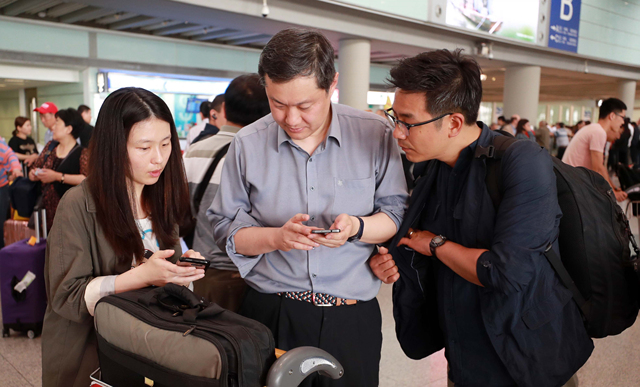 ▲ 풍계리 핵시설 폐쇄 취재단이 중국 베이징 서우두 공항에 도착한 모습. ⓒ뉴시스 DB