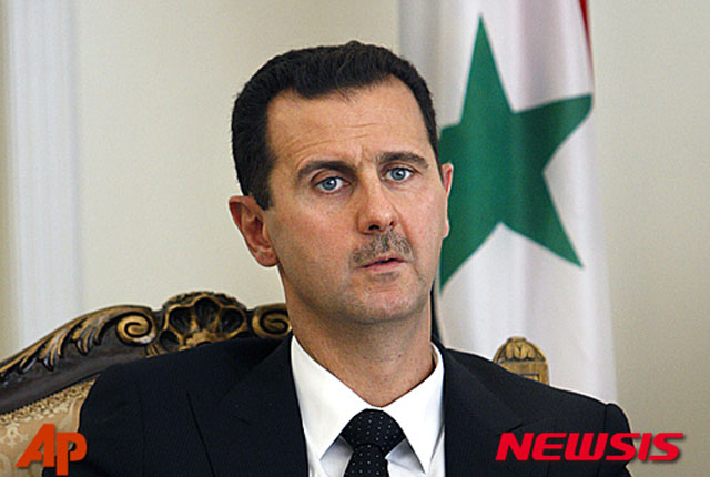 ▲ 세습 독재 중인 바샤르 알 아사드 시리아 대통령이 곧 방북해 김정은과 만날 예정이라고 한다. ⓒ뉴시스-AP. 무단전재 및 재배포 금지.