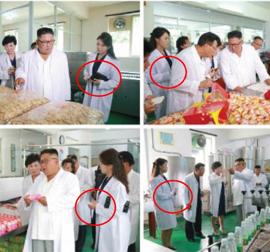 ▲ 김정은을 대동해 강원도 원산 송도원종합식료공장을 현지시찰 중인 리설주(붉은 원)가 수첩을 들고 있다.