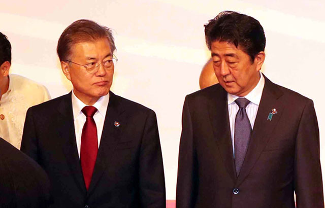▲ 문재인 대통령과 아베 신조 일본 총리. ⓒ뉴시스. 무단전재 및 재배포 금지.