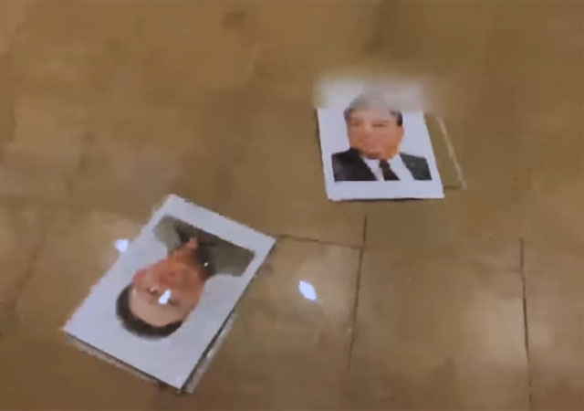 ▲ '자유조선'이 게재한 김씨 부자 초상화 액자 파괴 영상의 한 장면. ⓒ유튜브 '자유조선' 채널 화면캡쳐.