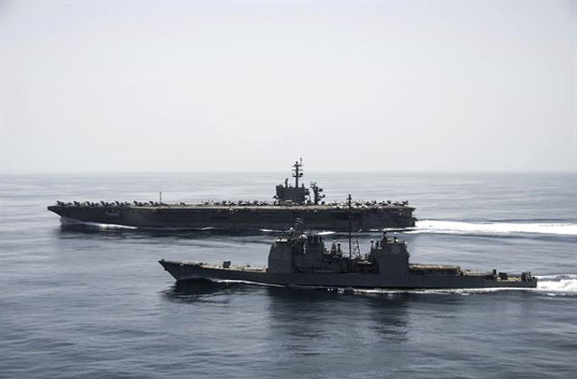▲ 아라비아 해를 항해하는 핵추진 항공모함 시어도어 루즈벨트 함과 이지스 순양함 노르망디 함. ⓒ미국 국방부 공개사진.