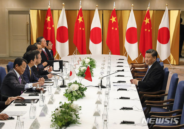 ▲ 지난 6월 27일 일본 오사카 G20 계기 일중 정상회담 때의 모습. ⓒ뉴시스 AP. 무단전재 및 재배포 금지.