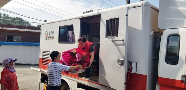 ▲ 청도군(군수 이승율)의 찾아가는 무료빨래방이 소외계층 및 취약계층으로부터 좋은 반응을 얻고 있다.ⓒ청도군