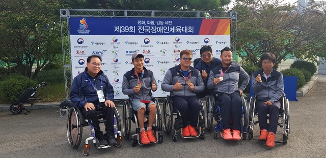 ▲ 달성군청 휠체어테니스단(감독 정필교)이 제39회 전국 장애인체육대회 단체전 우승을 거머쥐었다.ⓒ달성군