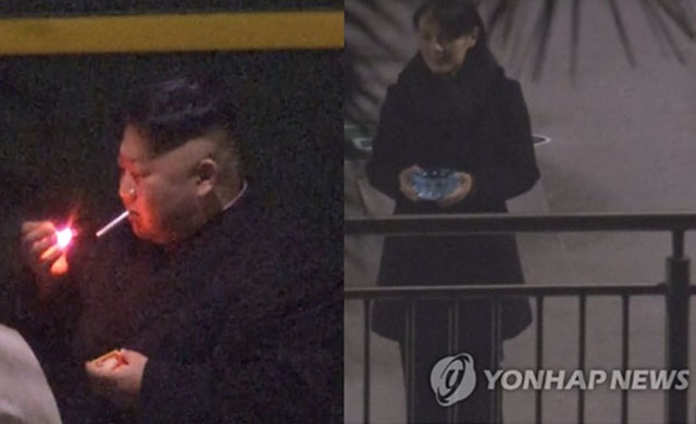 ▲ 지난해 2월 베트남 하노이 정상회담을 위해 가는 중 기차역에서 담배를 피는 김정은과 옆에서 재떨이를 들고 대기하는 김여정. ⓒ연합뉴스. 무단전재 및 재배포 금지.
