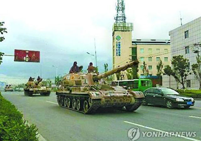 ▲ 2015년 8월 중국-북한 국경으로 인민해방군 병력이 집결했을 당시 모습. ⓒ연합뉴스. 무단전재 및 재배포 금지.