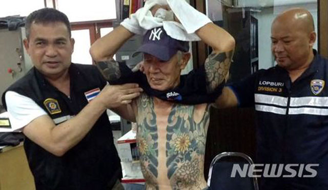 ▲ 2018년 1월 태국에서 붙잡힌 야쿠자 조직원. 당시 74세였다. ⓒ뉴시스. 무단전재 및 재배포 금지.