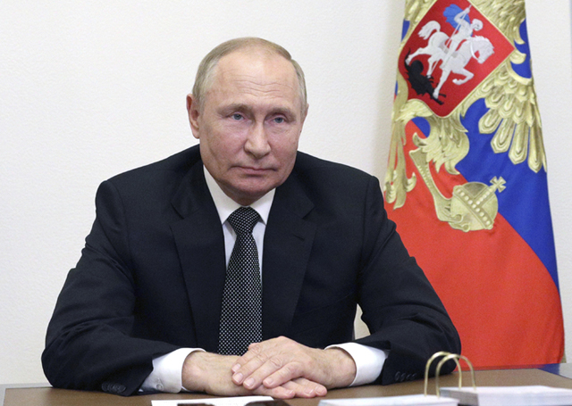 ▲ 지난 16일(현지시간) 모스크바 안보회의를 위해 화상연설을 하는 블라디미르 푸틴 러시아 대통령. ⓒ뉴시스 AP. 무단전재 및 재배포 금지.