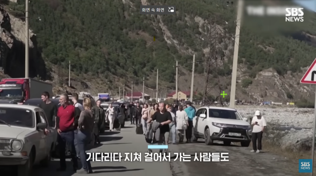 ▲ 조지아로 탈출하는 러시아인들ⓒSBS뉴스캡처