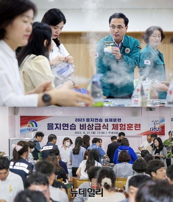 ▲ 박희조·최충규 대전 동구·대덕구청장은 21일 구청 후생관·을지연습장에서 열린 비상 급식 체험을 가졌다.ⓒ김경태 기자