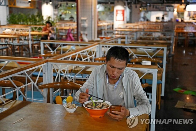 ▲ 식사하는 베이징 시민.ⓒ연합뉴스