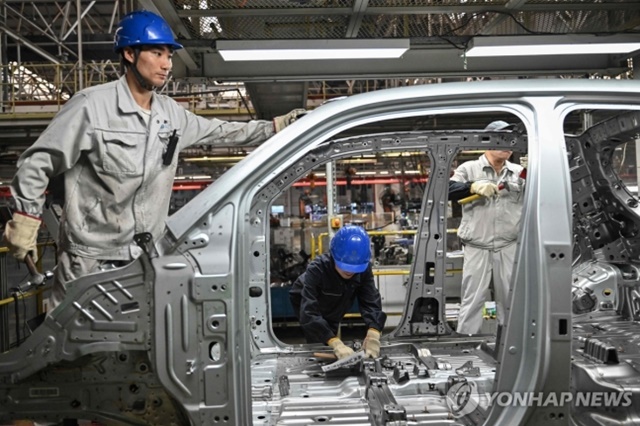▲ 중국 전기자동차 공장. AFP 연합뉴스 자료사진. ⓒ연합뉴스