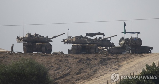 ▲ 가자지구 접경지의 이스라엘군 탱크. UPI 연합뉴스 자료사진. ⓒ연합뉴스