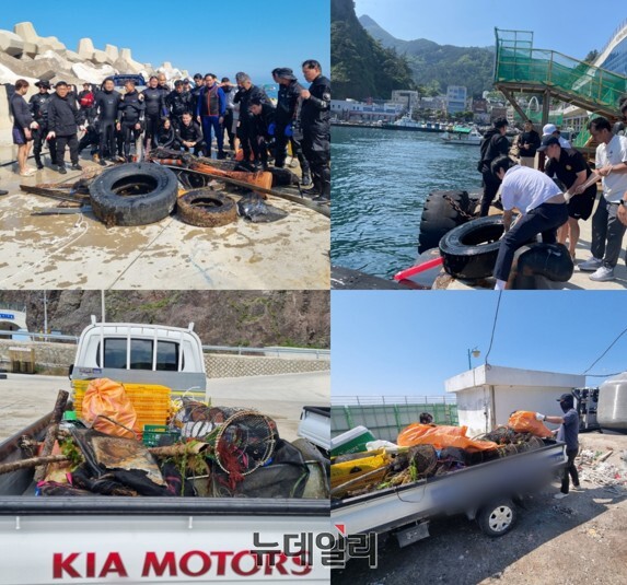 ▲ 양 단체가 수중에서 수거한 폐기물을 옮겨 싣고 있다. ⓒ뉴데일리