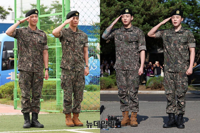▲ 군 복무를 마친 방탄소년단(BTS)의 RM(왼쪽부터), 뷔, 정국, 지민이 부대 인근 운동장에서 열린 전역식에서 거수경례를 하고 있다. ⓒ경기 연천=서성진 기자