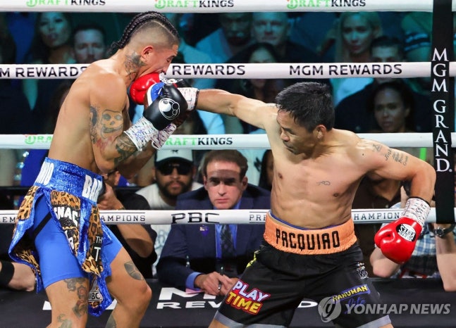 ▲ 필리핀 '복싱 영웅' 파키아오가 4년 만에 복귀전을 치렀고, 바리오스와 무승부를 거뒀다.ⓒ연합뉴스 제공